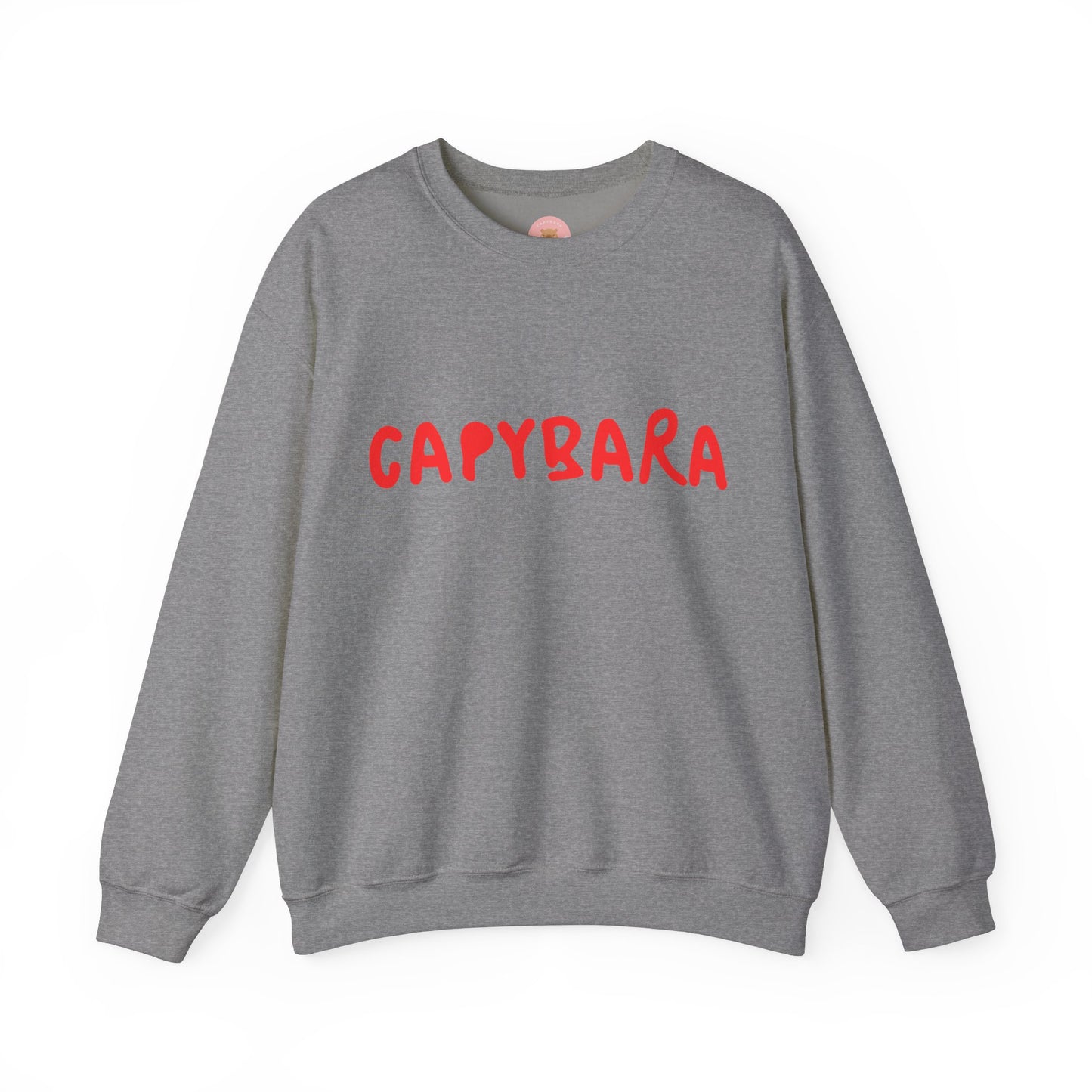 Capybara crewneck sweatshirt features the playful plain text design of CAPYBARA. It offers a comfy wearing experience with a classic fit and crew neckline. Perfect for colder months, this sweatshirt is ideal for those who love unique and chill designs. The target audience includes individuals who enjoy cozy apparel with a touch of personality. Relevant for holidays, casual gatherings, and everyday wear.