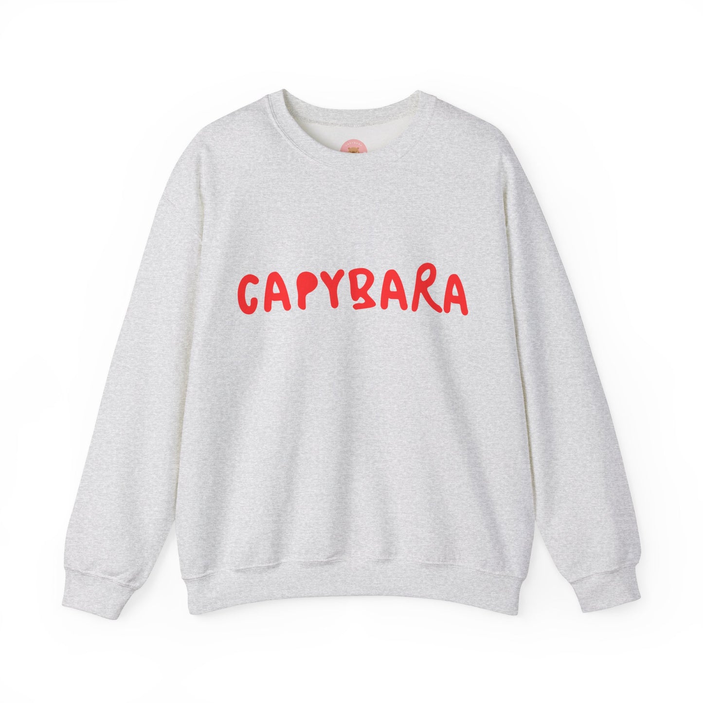 Capybara crewneck sweatshirt features the playful plain text design of CAPYBARA. It offers a comfy wearing experience with a classic fit and crew neckline. Perfect for colder months, this sweatshirt is ideal for those who love unique and chill designs. The target audience includes individuals who enjoy cozy apparel with a touch of personality. Relevant for holidays, casual gatherings, and everyday wear.