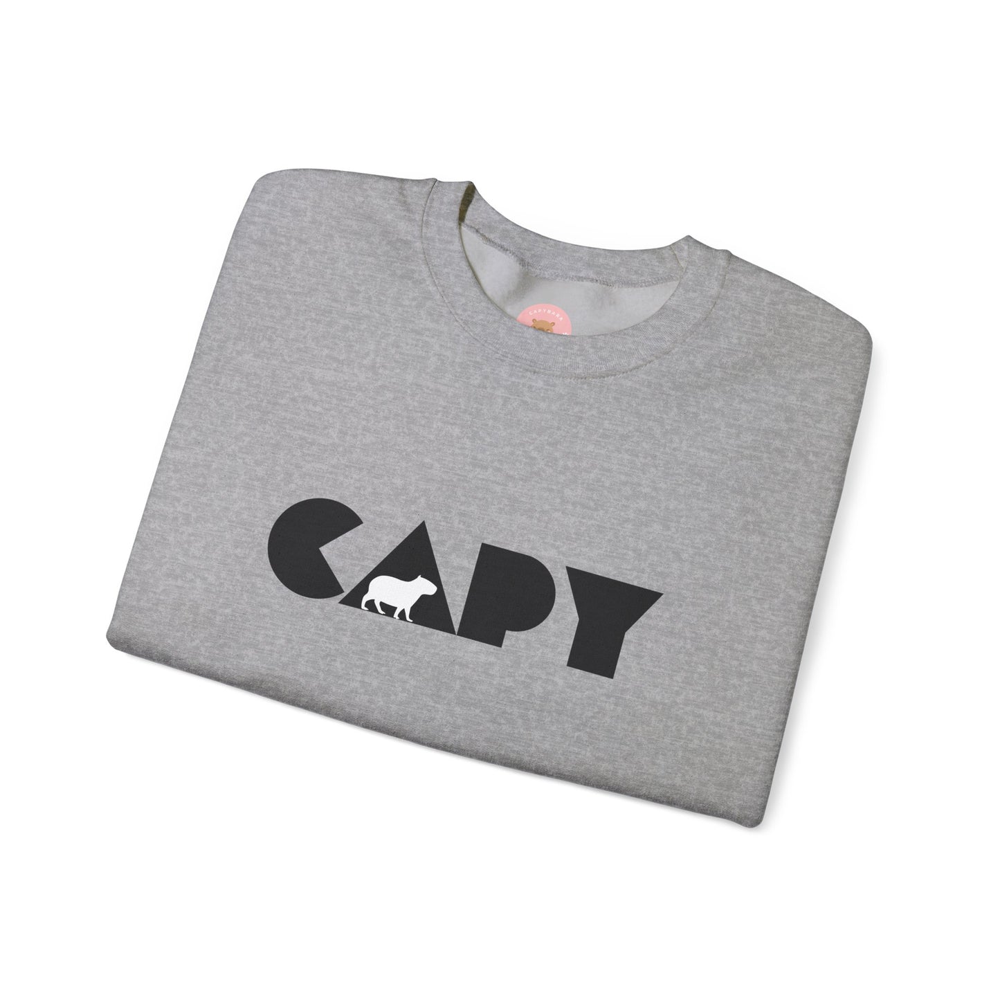 Capybara sweatshirt features the stylish plain text design of the word CAPY with a capybara graphic embedded. It offers a comfy wearing experience with a classic fit and crew neckline. Perfect for colder months, this sweatshirt is ideal for those who love unique and chill designs. The target audience includes individuals who enjoy cozy apparel with a touch of personality. Relevant for holidays, casual gatherings, and everyday wear.
