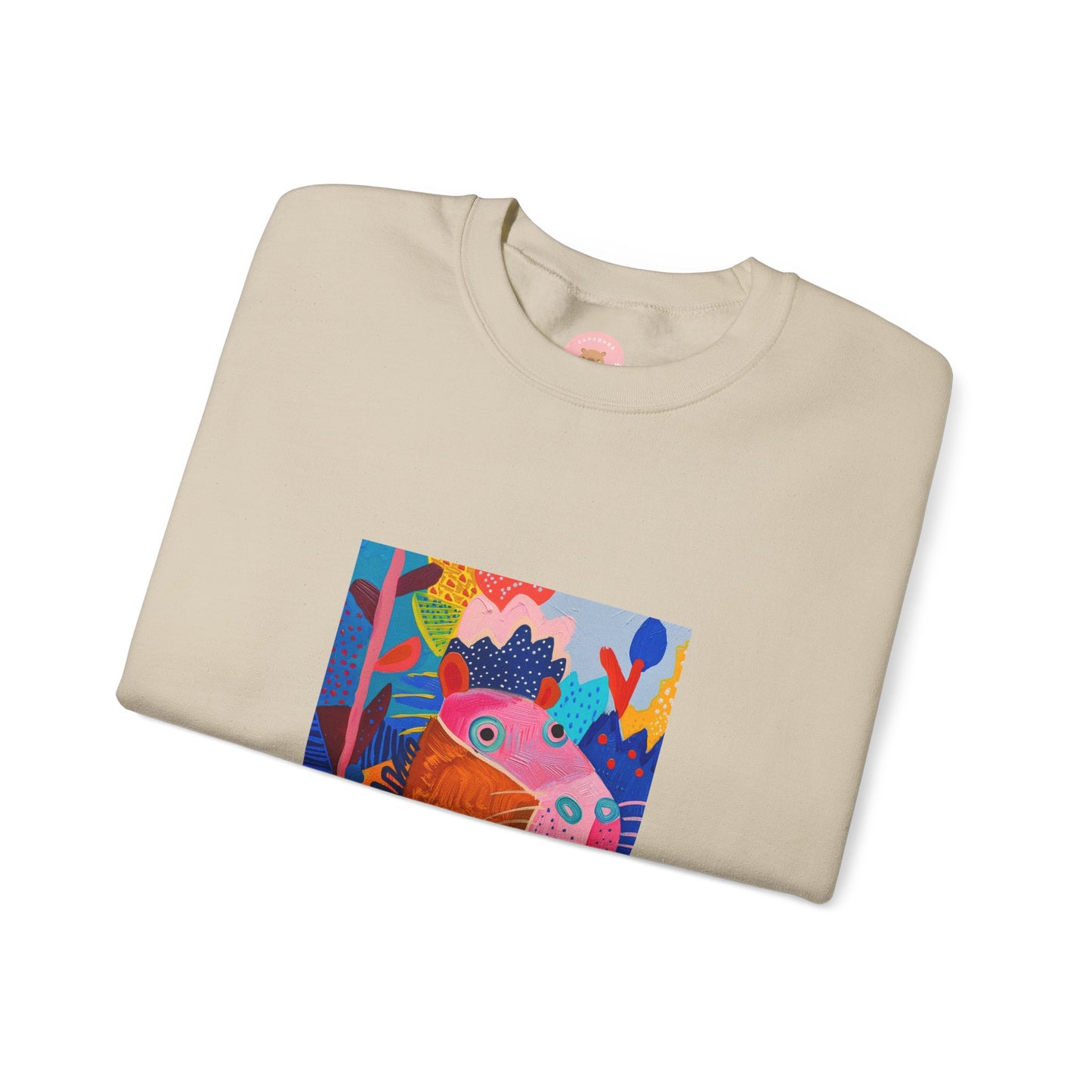 Sand Capybara sweatshirt features a painting inspired by Henri Matisse with a silly capybara embedded inside, perfect for capybara lovers and art enthusiasts. It offers a cozy and comfortable fit, making it ideal for colder months. The medium-heavy fabric blend of cotton and polyester ensures durability and warmth. Great for snuggling up at home or showcasing your unique style.