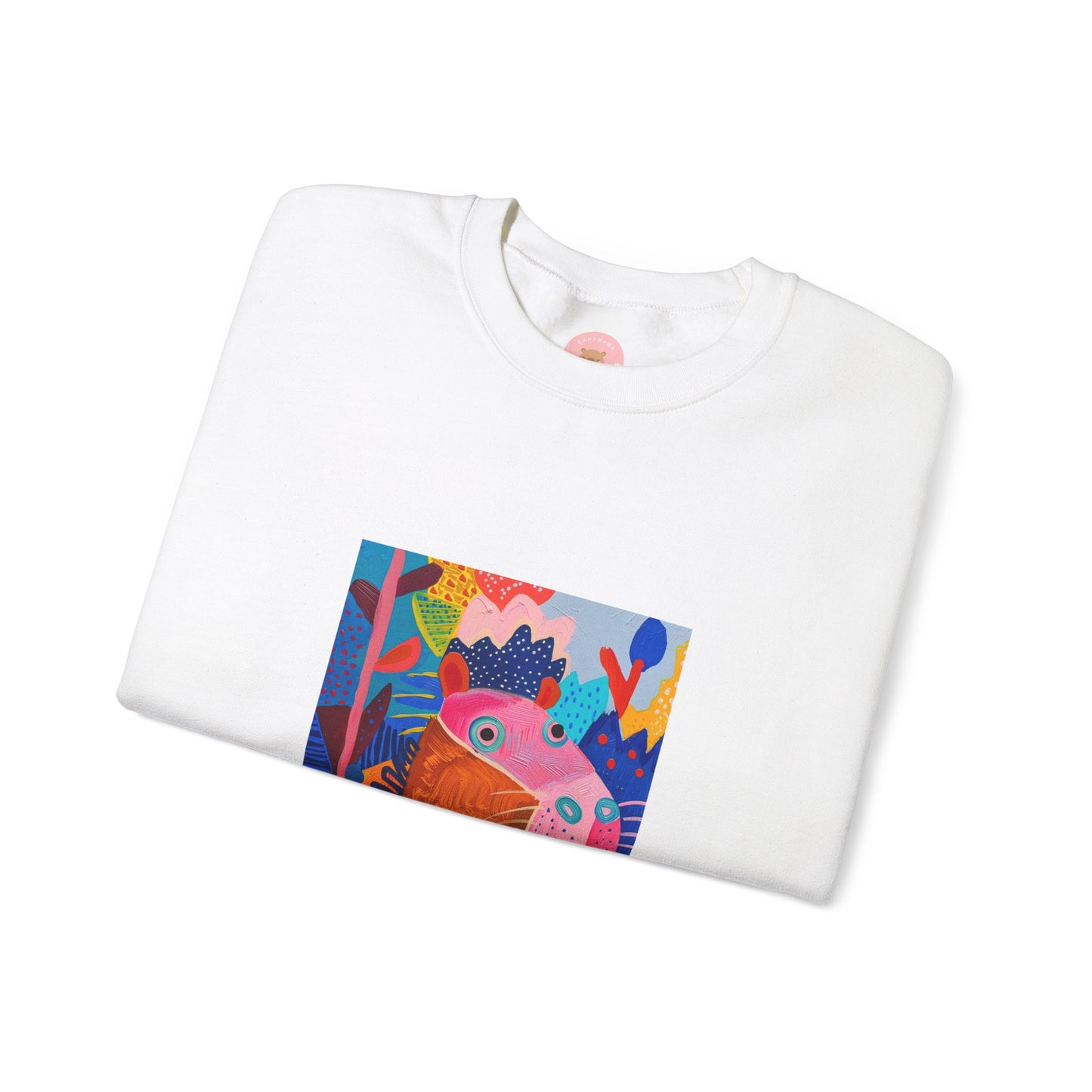 White Capybara sweatshirt features a painting inspired by Henri Matisse with a silly capybara embedded inside, perfect for capybara lovers and art enthusiasts. It offers a cozy and comfortable fit, making it ideal for colder months. The medium-heavy fabric blend of cotton and polyester ensures durability and warmth. Great for snuggling up at home or showcasing your unique style.