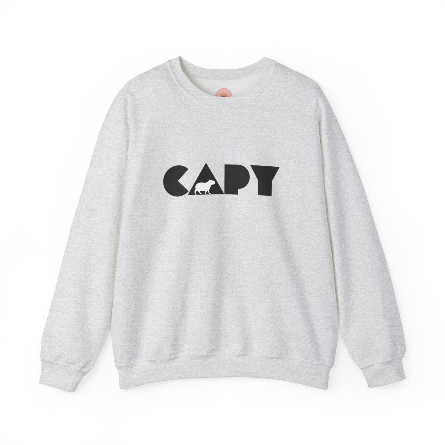 Capybara sweatshirt features the stylish plain text design of the word CAPY with a capybara graphic embedded. It offers a comfy wearing experience with a classic fit and crew neckline. Perfect for colder months, this sweatshirt is ideal for those who love unique and chill designs. The target audience includes individuals who enjoy cozy apparel with a touch of personality. Relevant for holidays, casual gatherings, and everyday wear.