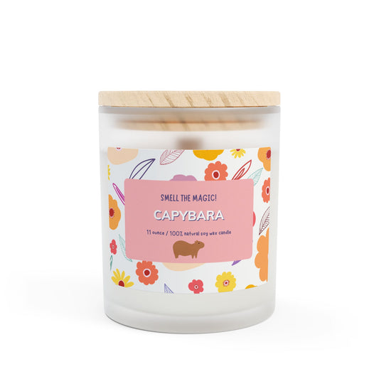 Capybara Gift 11oz Frost Candle, featuring a funny label featuring a cute capybara and a flowery background. It has an unique wooden wick that crackles gently as it burns. This exquisite candle is more than just a light source—it's an elegant piece of decor