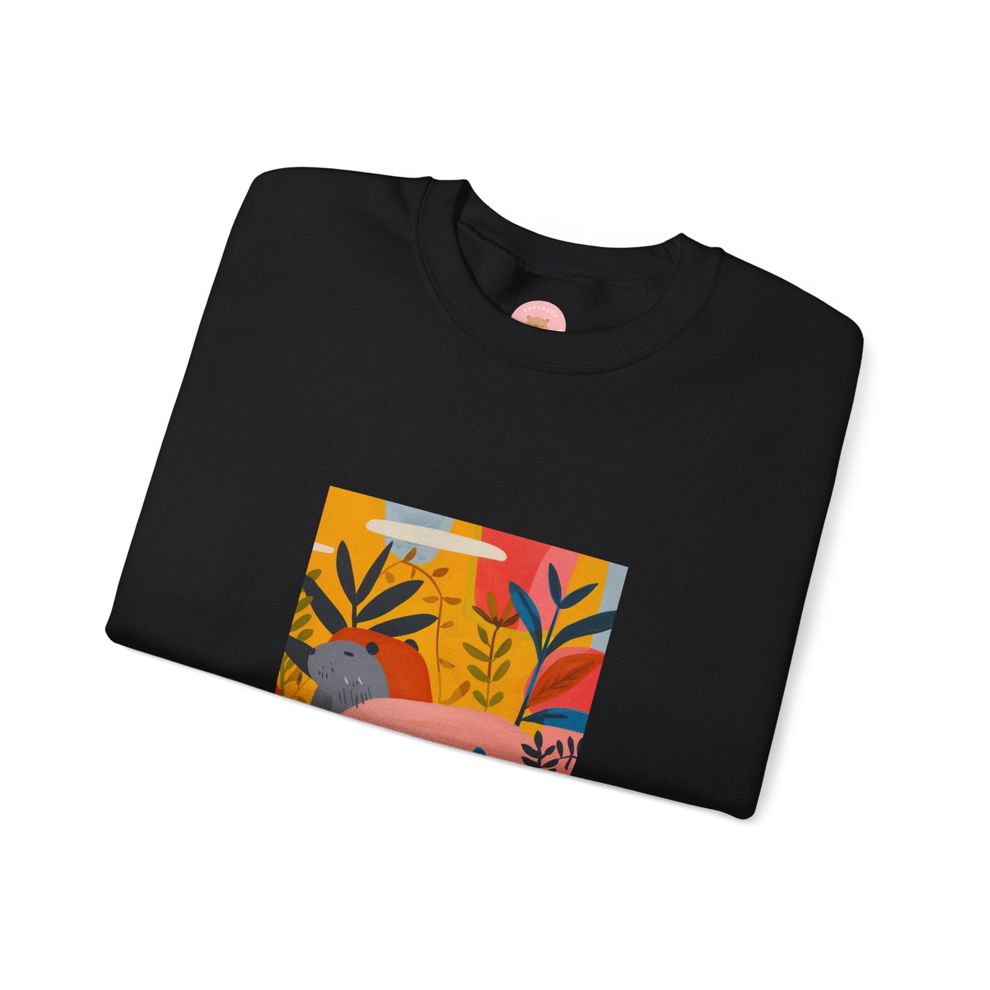 Black Capybara sweatshirt features a painting inspired by Henri Matisse with a funny twist, perfect for capybara lovers and art enthusiasts. It offers a cozy and comfortable fit, making it ideal for colder months. The medium-heavy fabric blend of cotton and polyester ensures durability and warmth. Great for snuggling up at home or showcasing your unique style.