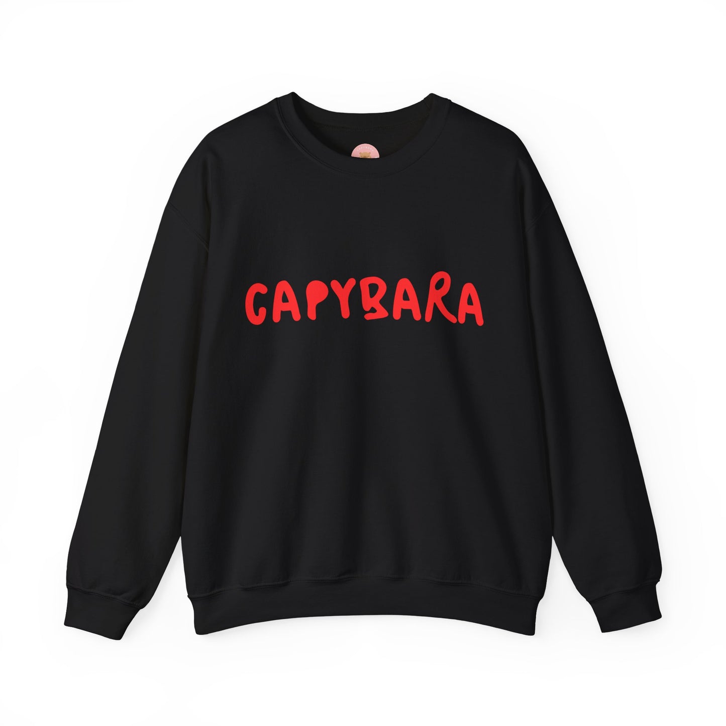 Capybara crewneck sweatshirt features the playful plain text design of CAPYBARA. It offers a comfy wearing experience with a classic fit and crew neckline. Perfect for colder months, this sweatshirt is ideal for those who love unique and chill designs. The target audience includes individuals who enjoy cozy apparel with a touch of personality. Relevant for holidays, casual gatherings, and everyday wear.