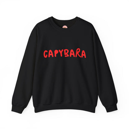 Capybara crewneck sweatshirt features the playful plain text design of CAPYBARA. It offers a comfy wearing experience with a classic fit and crew neckline. Perfect for colder months, this sweatshirt is ideal for those who love unique and chill designs. The target audience includes individuals who enjoy cozy apparel with a touch of personality. Relevant for holidays, casual gatherings, and everyday wear.