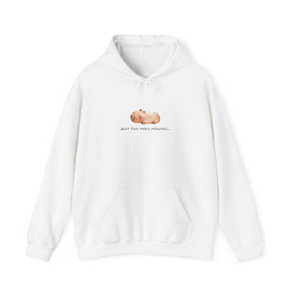 Just Five More Minutes...Capybara Unisex Hooded Sweatshirt is made for the ultimate snoozer! Featuring a relaxed capybara graphic, this cozy hoodie perfectly captures those lazy mornings when you just need a little more time. Soft, warm, and perfect for everyday wear, it’s the ideal companion for staying comfy and showing off your love for capybaras and chill vibes!