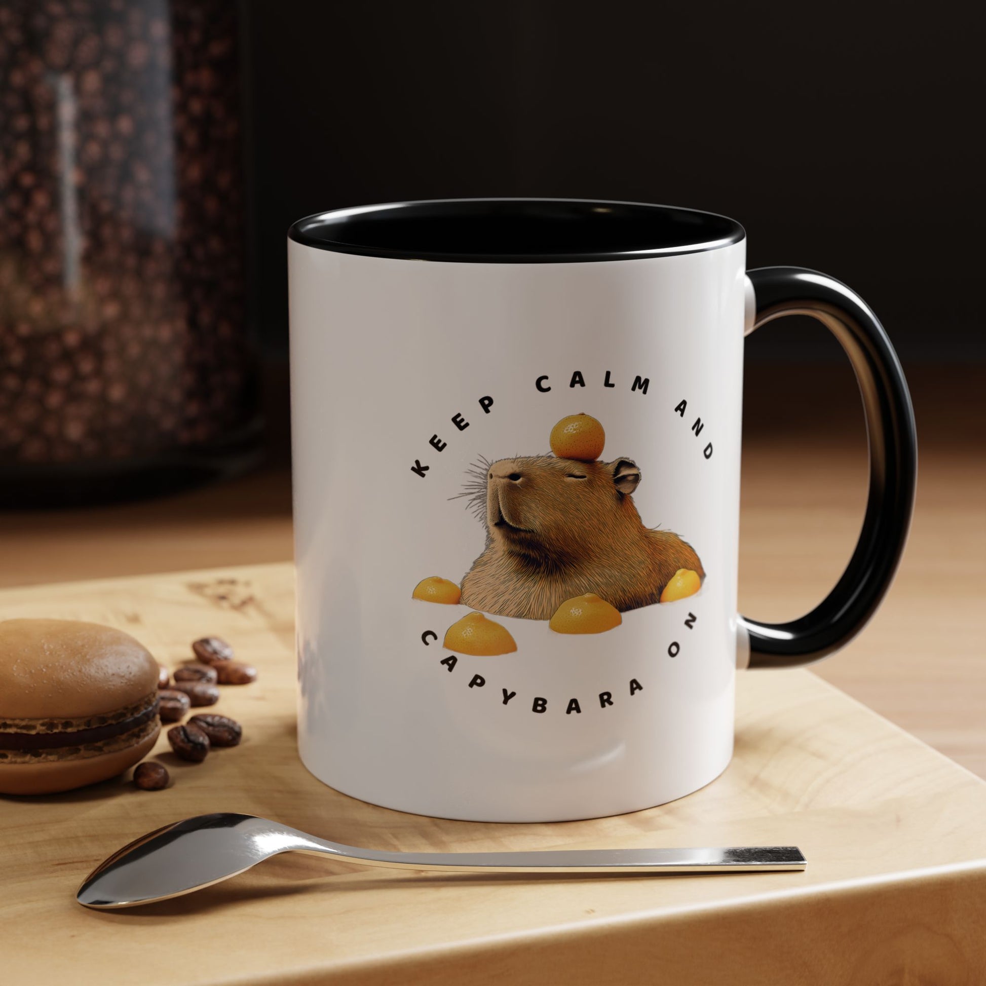 Keep Calm and Capybara On Mug. Featuring a leisurely capybara, this mug is the perfect addition to your coffee or tea routine. Ideal for animal enthusiasts and those looking for a touch of humor in their morning beverage. An excellent gift for Christmas, birthdays, or any special occasion, this mug is made of white ceramic, with a choice of 5 colorful interiors and handles. It also boasts a c-shaped handle, glossy finish, and eye-catching color contrast, while being 