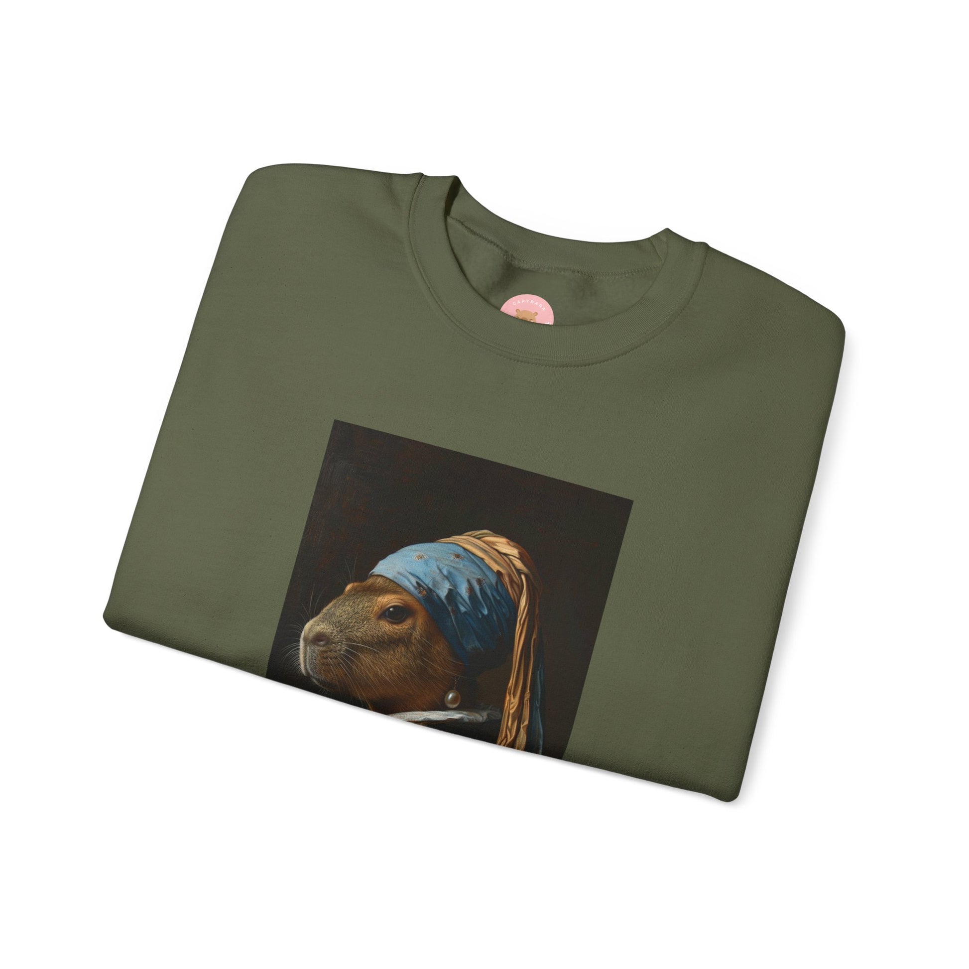 Capy de Vermeer Capybara sweatshirt features a painting inspired by VERMEER's famous painting - A Girl With A Pearl Earring. It's a fun twist for capybara lovers and art enthusiasts, giving off a whimsical and artistic vibe. Perfect for those who appreciate unique and creative designs, this sweatshirt is relevant for art lovers, animal enthusiasts, and those looking for a quirky addition to their wardrobe. Ideal for gifting during birthdays, Christmas, or any special occasion.