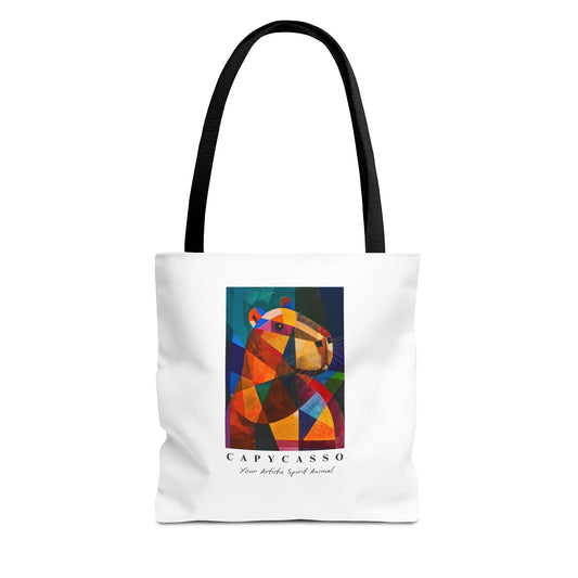 Capybara tote bag featuring a painting inspired by Pablo Picasso, with abstract forms and geometric shapes. 5 handle colours. Perfect for art lovers and capybara enthusiasts, this tote bag adds a touch of artistic flair to your everyday errands. Great for carrying books, groceries, or daily essentials. Ideal for art enthusiasts, animal lovers, and those looking to add a pop of creativity to their style. Perfect for gifting on birthdays, holidays, or as a treat for yourself.