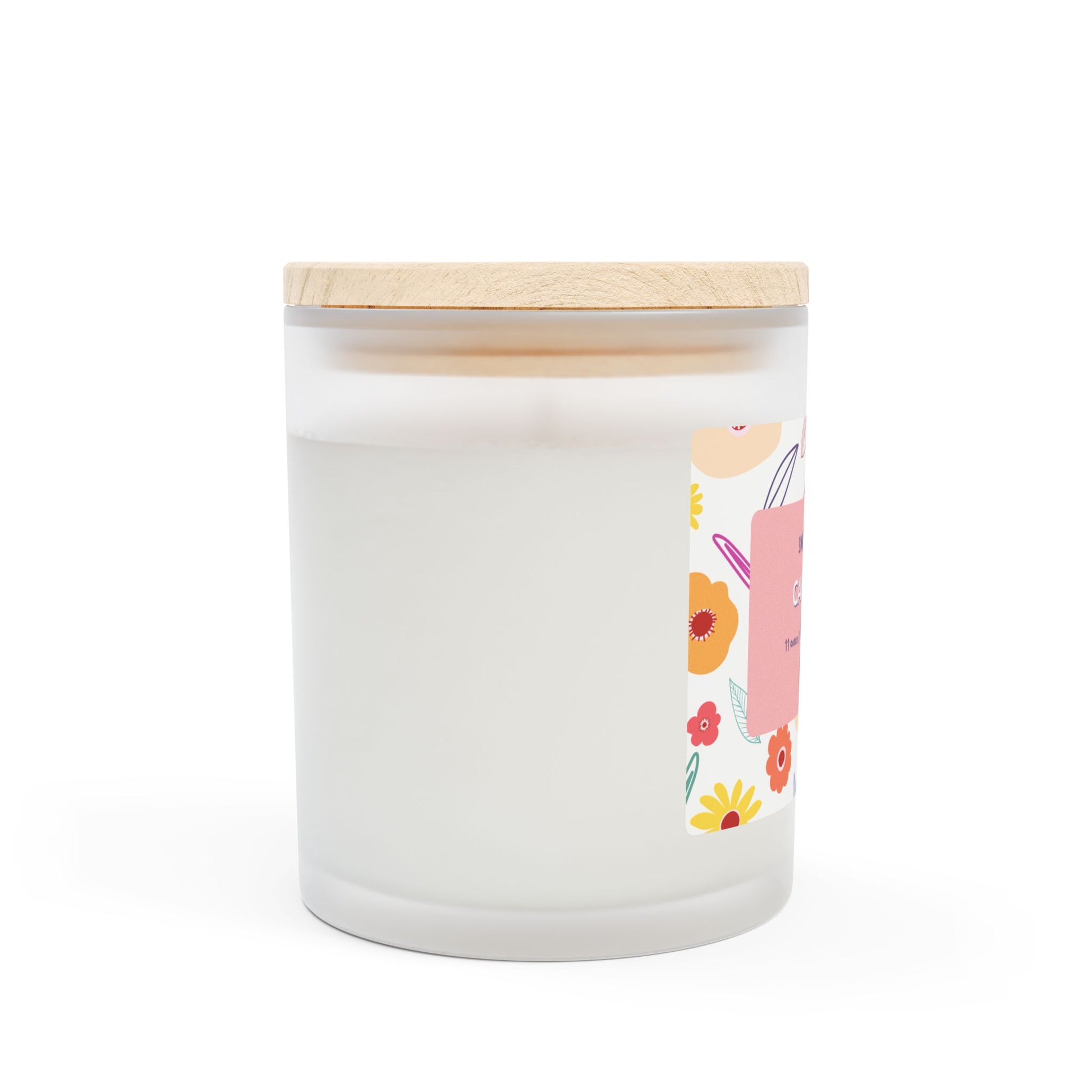 Capybara Gift 11oz Frost Candle, featuring a funny label featuring a cute capybara and a flowery background. It has an unique wooden wick that crackles gently as it burns. This exquisite candle is more than just a light source—it's an elegant piece of decor