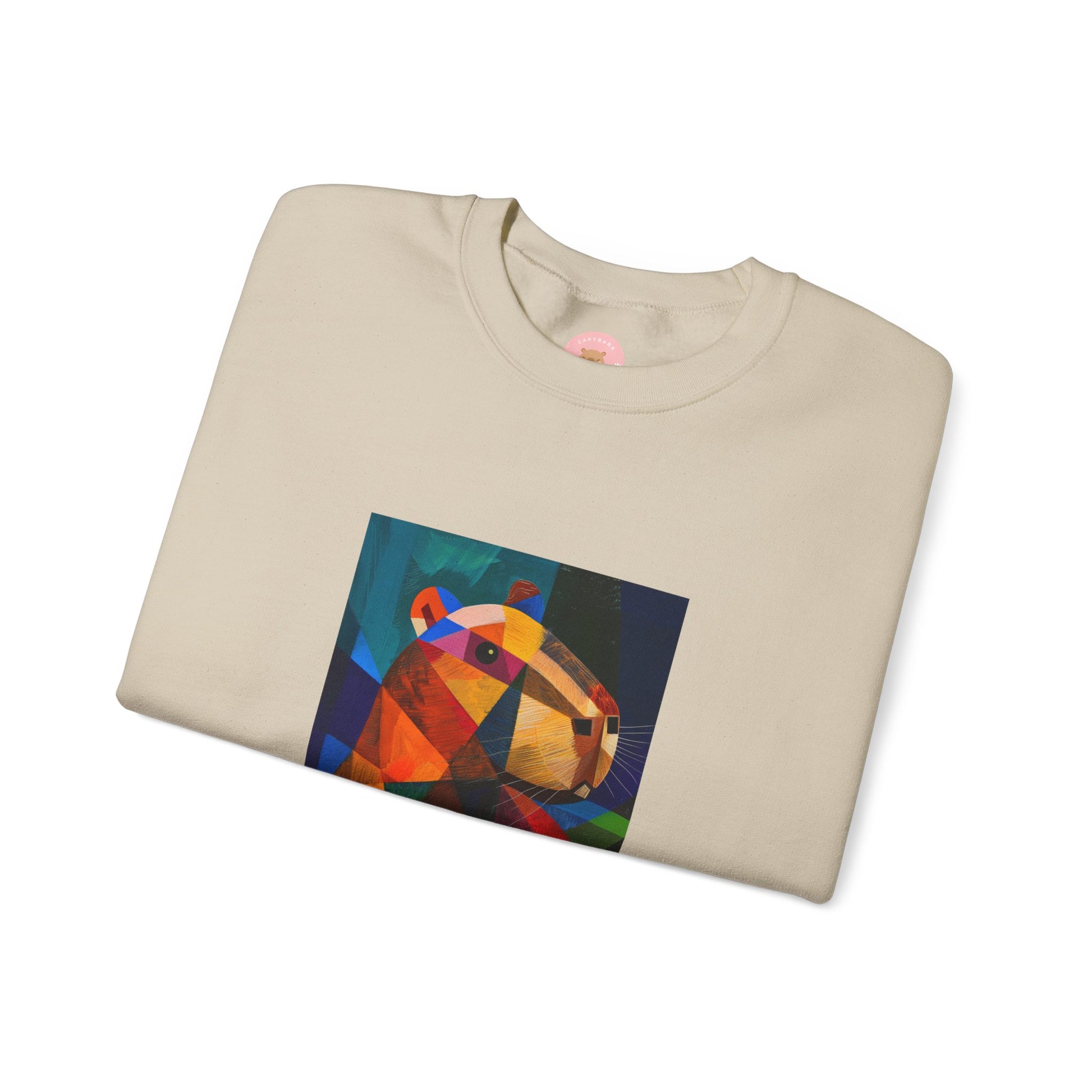 Capycasso Capybara sweatshirt features a painting inspired by Pablo Picasso, with abstract forms and geometric shapes. It adds a funny vibe and is perfect for capybara and art lovers. This cozy sweatshirt is ideal for colder months and offers a comfy wearing experience with top-tier durability.