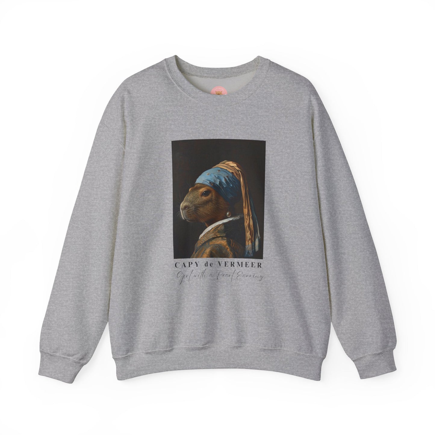 Capy de Vermeer Capybara sweatshirt features a painting inspired by VERMEER's famous painting - A Girl With A Pearl Earring. It's a fun twist for capybara lovers and art enthusiasts, giving off a whimsical and artistic vibe. Perfect for those who appreciate unique and creative designs, this sweatshirt is relevant for art lovers, animal enthusiasts, and those looking for a quirky addition to their wardrobe. Ideal for gifting during birthdays, Christmas, or any special occasion.
