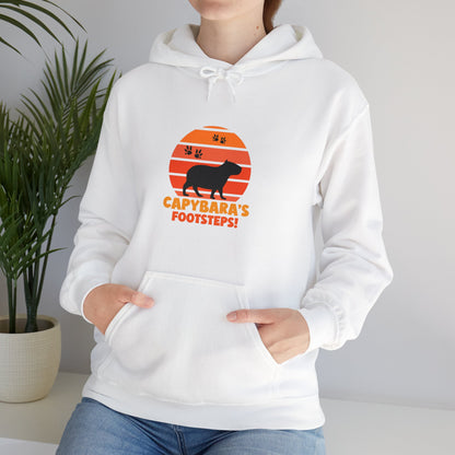 Capybara Footsteps hooded sweatshirt. This hoodies is perfect for those who love for animal lovers and those who appreciate a whimsical touh in their wardrobe.