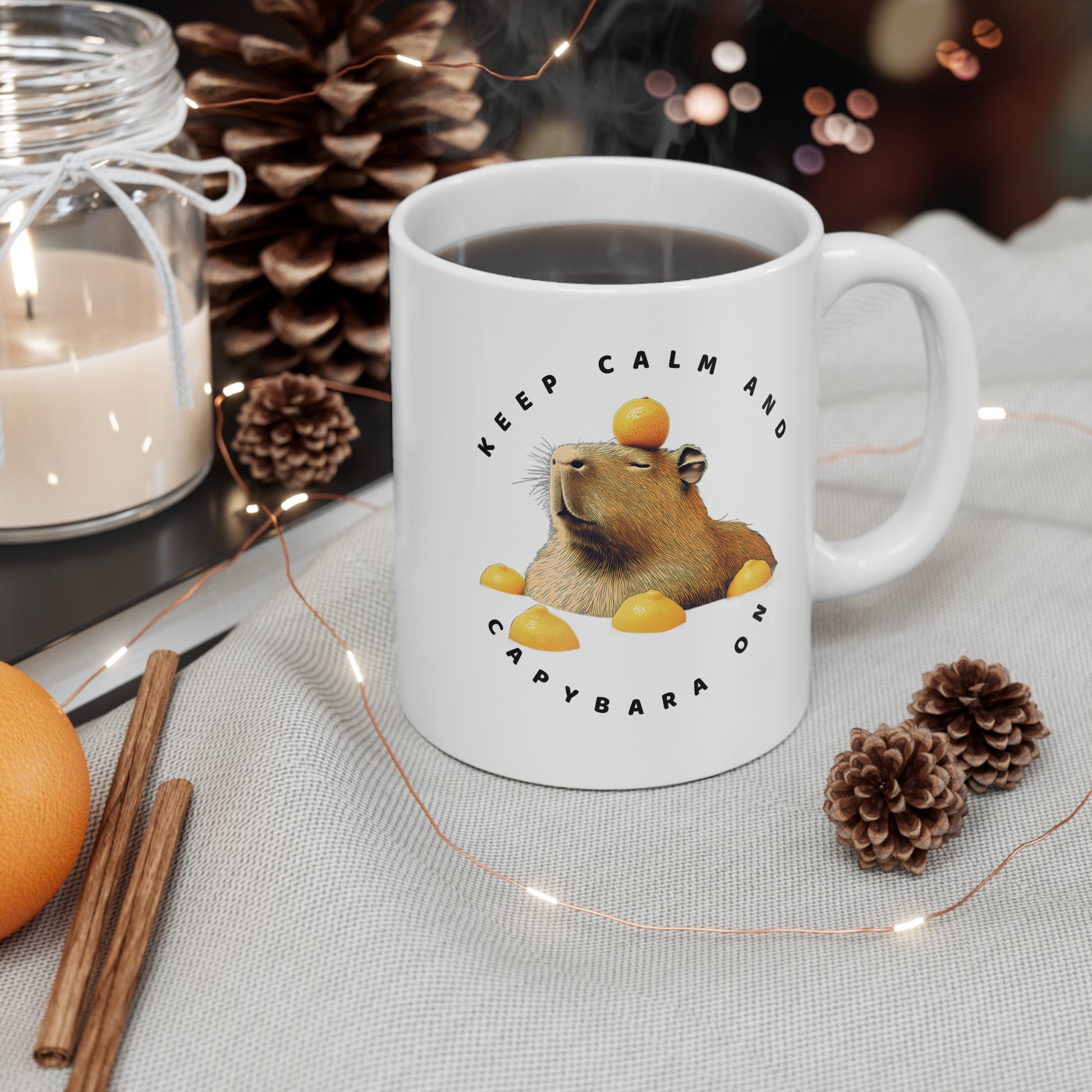 Keep Calm and Capybara On Mug. Featuring a leisurely capybara, this mug is the perfect addition to your coffee or tea routine. Ideal for animal enthusiasts and those looking for a touch of humor in their morning beverage. An excellent gift for Christmas, birthdays, or any special occasion, this mug is made of white ceramic. It also has a c-shaped handle, glossy finish.
