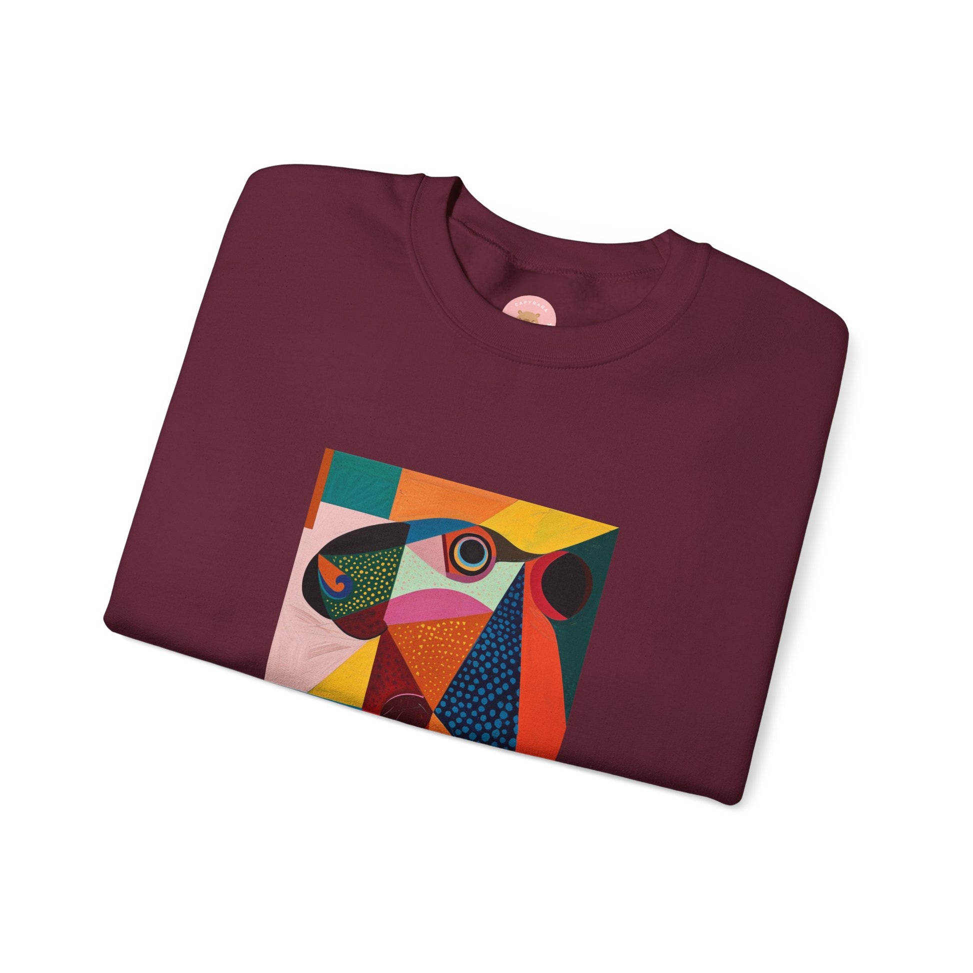 Capycasso Capybara sweatshirt features a painting inspired by Pablo Picasso, with very abstract forms and geometric shapes. It adds a funny vibe and is perfect for capybara and art lovers. This cozy sweatshirt is ideal for colder months and offers a comfy wearing experience with top-tier durability.