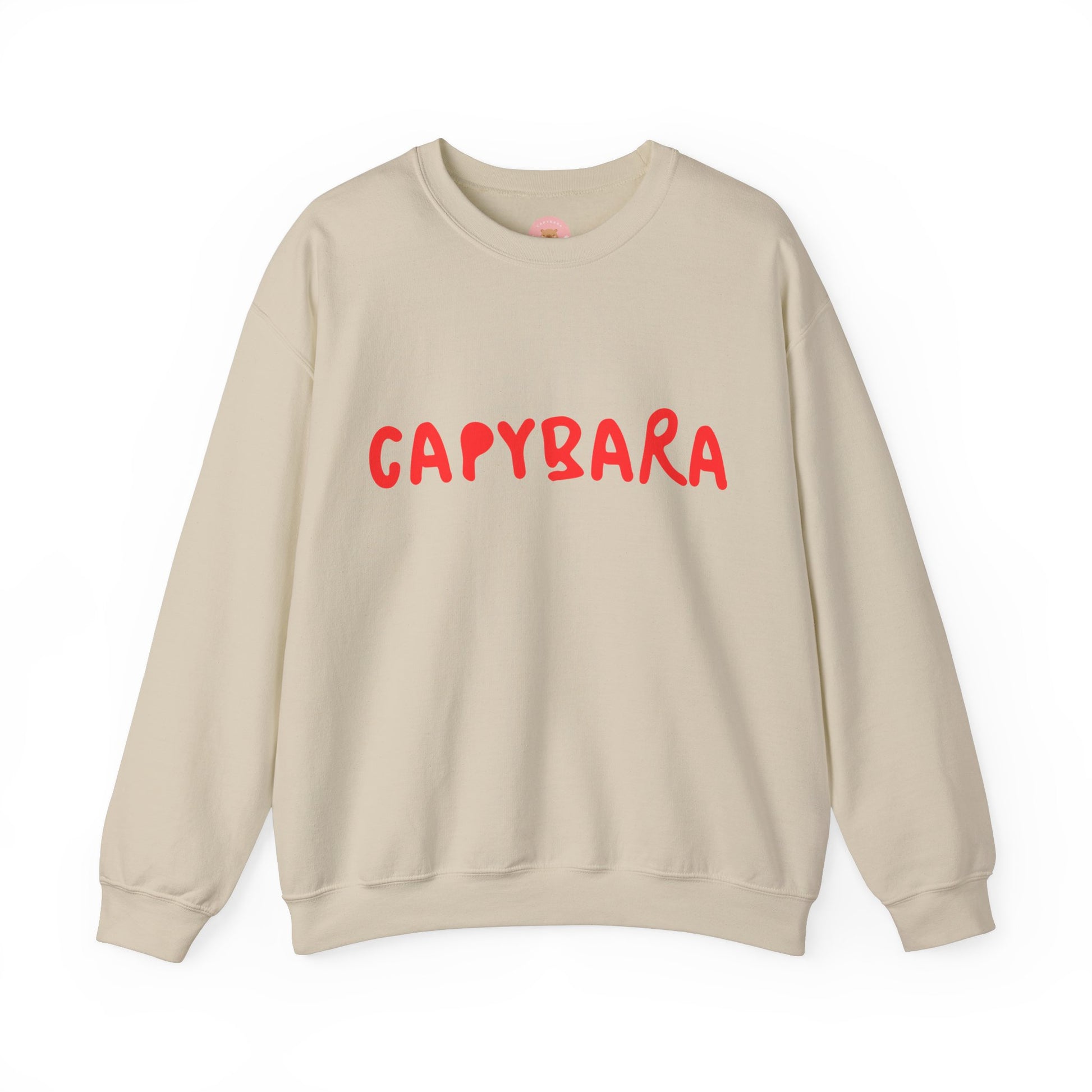 Capybara crewneck sweatshirt features the playful plain text design of CAPYBARA. It offers a comfy wearing experience with a classic fit and crew neckline. Perfect for colder months, this sweatshirt is ideal for those who love unique and chill designs. The target audience includes individuals who enjoy cozy apparel with a touch of personality. Relevant for holidays, casual gatherings, and everyday wear.