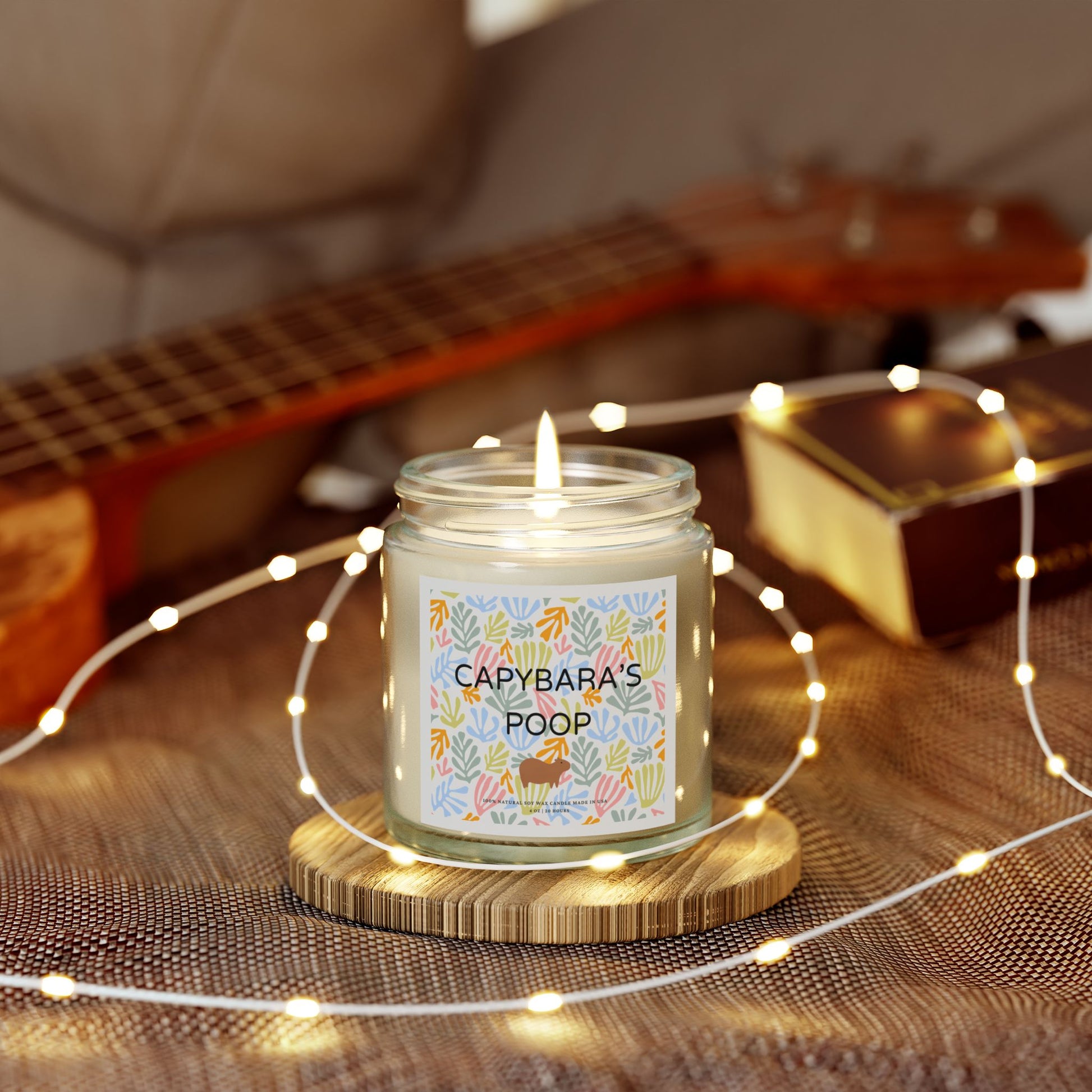 Funny candle gift with CAPYBARAS POOP label in Matisse style. Each candle is scented with Midnight Blackberry, Lavender, Fraser Fir, Cinnamon Chai, Cashmere Musk, Beachwood, Mango Coconut, and Vanilla Bean fragrances, offering up to 20 hours of burn time. Made with natural Coconut Apricot Wax in the USA, eco-friendly and non-toxic.