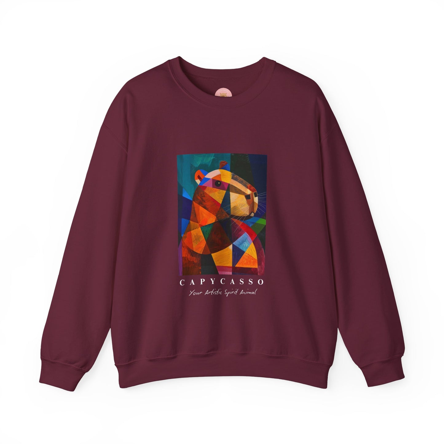 Capycasso Capybara sweatshirt features a painting inspired by Pablo Picasso, with abstract forms and geometric shapes. It adds a funny vibe and is perfect for capybara and art lovers. This cozy sweatshirt is ideal for colder months and offers a comfy wearing experience with top-tier durability.