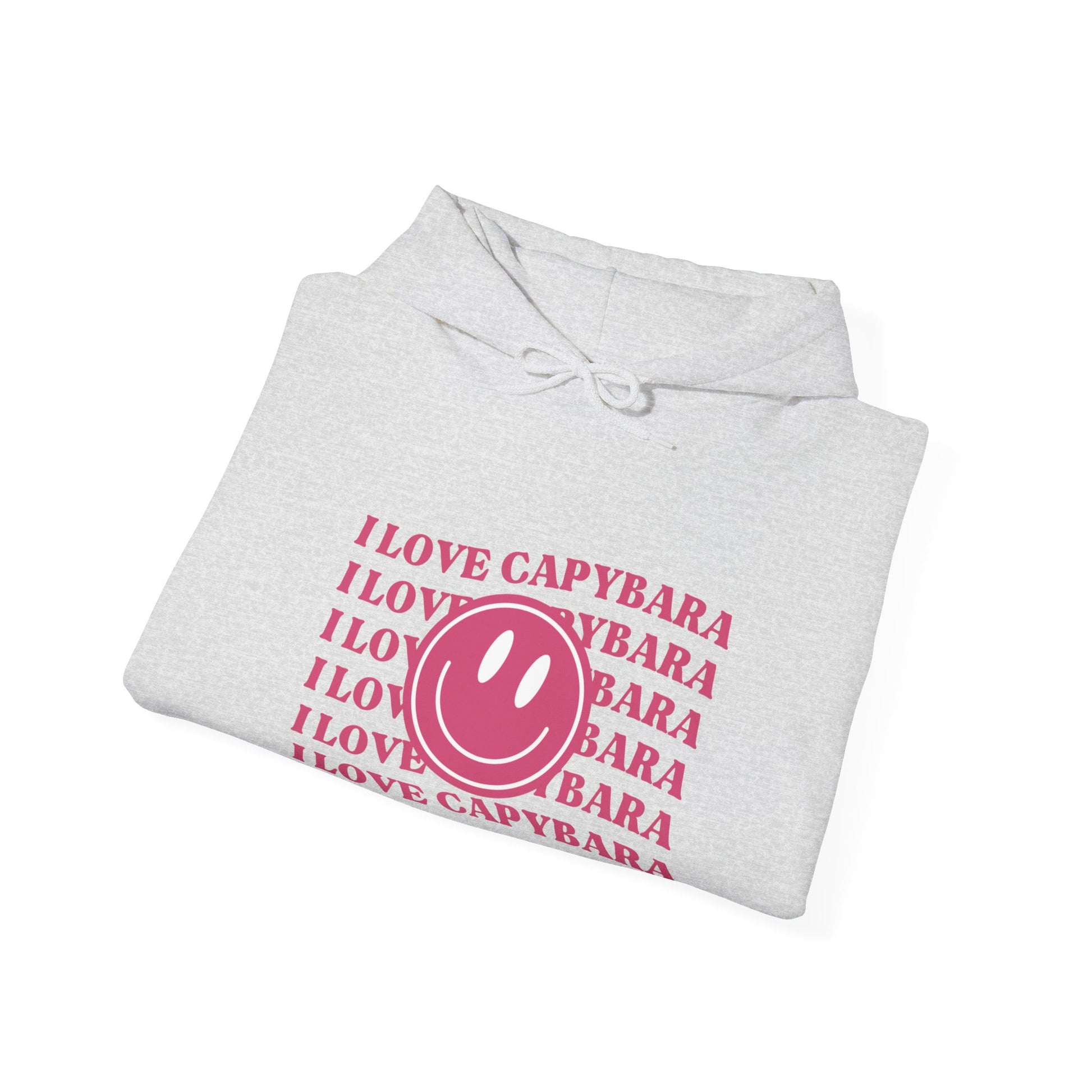 I Love Capybara hooded sweatshirt. This hoodies has a smiley face and is perfect for those who love calm vibes. Soft and comfy, it's an ideal choice for capybara lovers looking for a peaceful, stylish addition to their wardrobe.