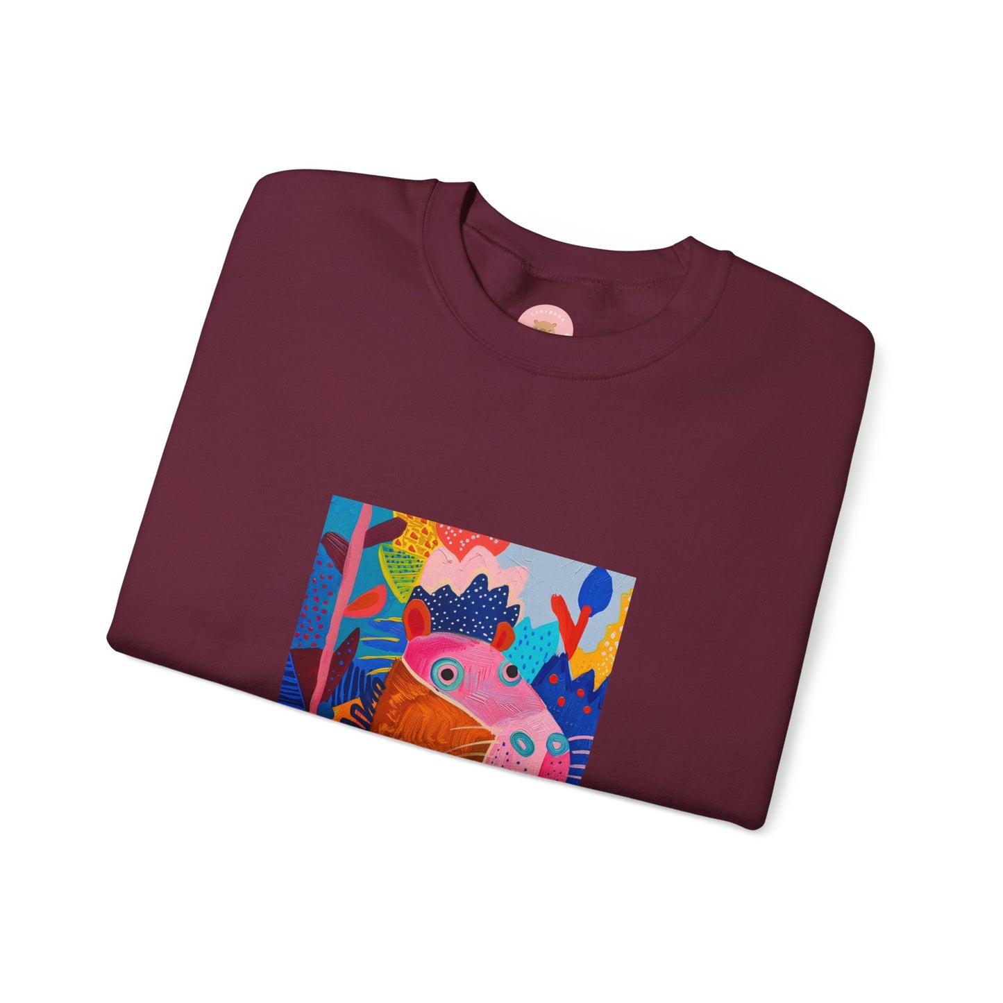 Marron Capybara sweatshirt features a painting inspired by Henri Matisse with a silly capybara embedded inside, perfect for capybara lovers and art enthusiasts. It offers a cozy and comfortable fit, making it ideal for colder months. The medium-heavy fabric blend of cotton and polyester ensures durability and warmth. Great for snuggling up at home or showcasing your unique style.