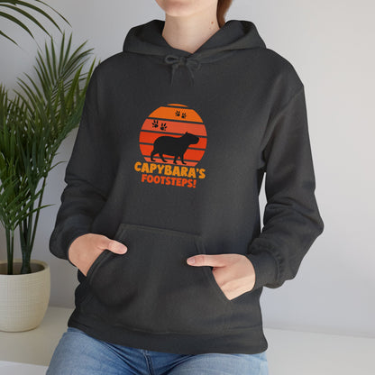 Capybara Footsteps hooded sweatshirt. This hoodies is perfect for those who love for animal lovers and those who appreciate a whimsical touh in their wardrobe.