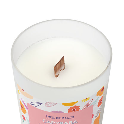 Capybara Gift 11oz Frost Candle, featuring a funny label featuring a cute capybara and a flowery background. It has an unique wooden wick that crackles gently as it burns. This exquisite candle is more than just a light source—it's an elegant piece of decor