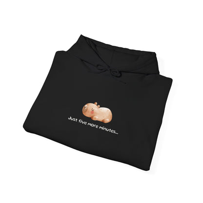 Just Five More Minutes...Capybara Unisex Hooded Sweatshirt is made for the ultimate snoozer! Featuring a relaxed capybara graphic, this cozy hoodie perfectly captures those lazy mornings when you just need a little more time. Soft, warm, and perfect for everyday wear, it’s the ideal companion for staying comfy and showing off your love for capybaras and chill vibes!