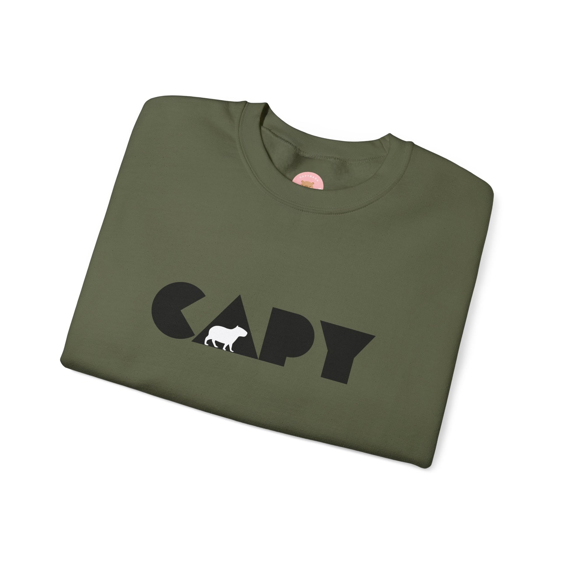 Capybara sweatshirt features the stylish plain text design of the word CAPY with a capybara graphic embedded. It offers a comfy wearing experience with a classic fit and crew neckline. Perfect for colder months, this sweatshirt is ideal for those who love unique and chill designs. The target audience includes individuals who enjoy cozy apparel with a touch of personality. Relevant for holidays, casual gatherings, and everyday wear.
