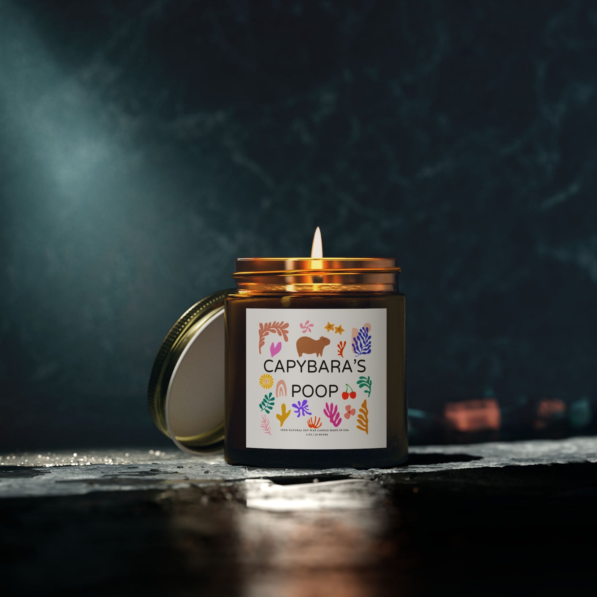 Funny candle gift with CAPYBARAS POOP label in Matisse style. Each candle is scented with Midnight Blackberry, Lavender, Fraser Fir, Cinnamon Chai, Cashmere Musk, Beachwood, Mango Coconut, and Vanilla Bean fragrances, offering up to 20 hours of burn time. Made with natural Coconut Apricot Wax in the USA, eco-friendly and non-toxic.