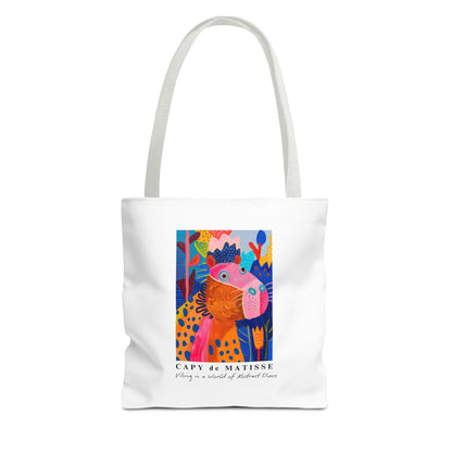 Capybara tote bag featuring a graphic of a painting inspired by artist Henri Matisse, with a hidden capybara. Perfect for art lovers and capybara enthusiasts, this tote bag adds a touch of artistic flair to your everyday errands. Great for carrying books, groceries, or daily essentials. Ideal for art enthusiasts, animal lovers, and those looking to add a pop of creativity to their style. Perfect for gifting on birthdays, holidays, or as a treat for yourself.