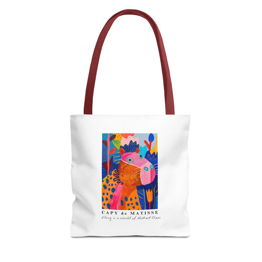Capybara tote bag featuring a graphic of a painting inspired by artist Henri Matisse, with a hidden capybara. Perfect for art lovers and capybara enthusiasts, this tote bag adds a touch of artistic flair to your everyday errands. Great for carrying books, groceries, or daily essentials. Ideal for art enthusiasts, animal lovers, and those looking to add a pop of creativity to their style. Perfect for gifting on birthdays, holidays, or as a treat for yourself.