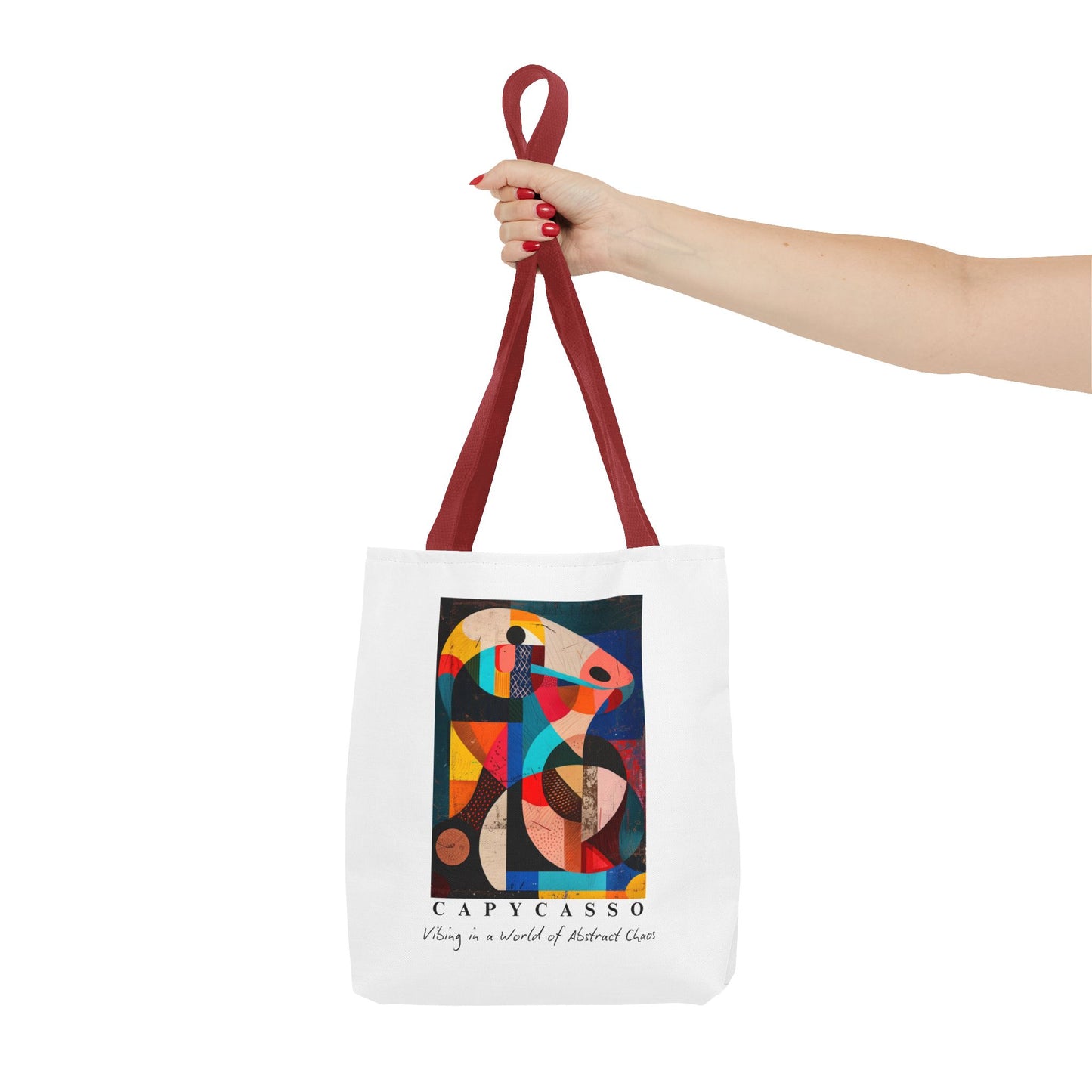 Capybara tote bag featuring a painting inspired by Pablo Picasso, with abstract forms and geometric shapes. 5 handle colours. Perfect for art lovers and capybara enthusiasts, this tote bag adds a touch of artistic flair to your everyday errands. Great for carrying books, groceries, or daily essentials. Ideal for art enthusiasts, animal lovers, and those looking to add a pop of creativity to their style. Perfect for gifting on birthdays, holidays, or as a treat for yourself.