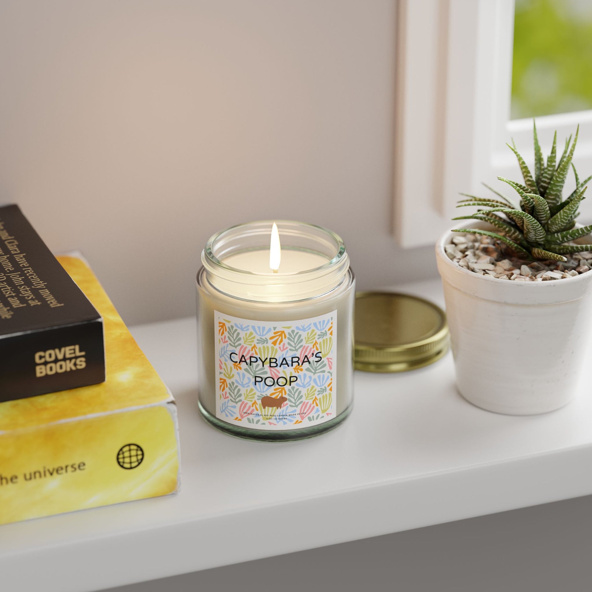 Funny candle gift with CAPYBARAS POOP label in Matisse style. Each candle is scented with Midnight Blackberry, Lavender, Fraser Fir, Cinnamon Chai, Cashmere Musk, Beachwood, Mango Coconut, and Vanilla Bean fragrances, offering up to 20 hours of burn time. Made with natural Coconut Apricot Wax in the USA, eco-friendly and non-toxic.