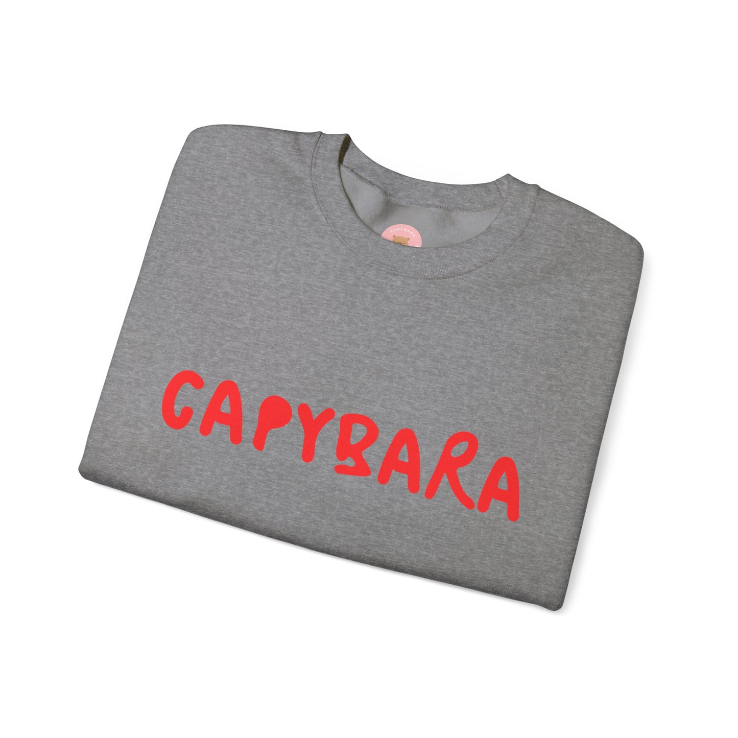 Capybara crewneck sweatshirt features the playful plain text design of CAPYBARA. It offers a comfy wearing experience with a classic fit and crew neckline. Perfect for colder months, this sweatshirt is ideal for those who love unique and chill designs. The target audience includes individuals who enjoy cozy apparel with a touch of personality. Relevant for holidays, casual gatherings, and everyday wear.