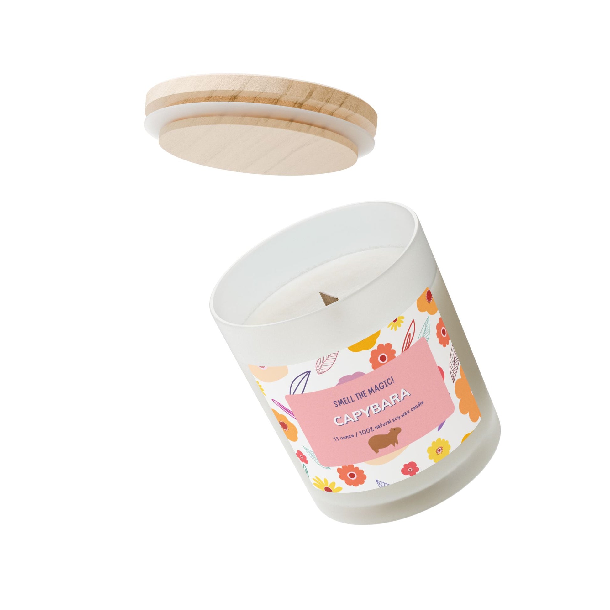 Capybara Gift 11oz Frost Candle, featuring a funny label featuring a cute capybara and a flowery background. It has an unique wooden wick that crackles gently as it burns. This exquisite candle is more than just a light source—it's an elegant piece of decor