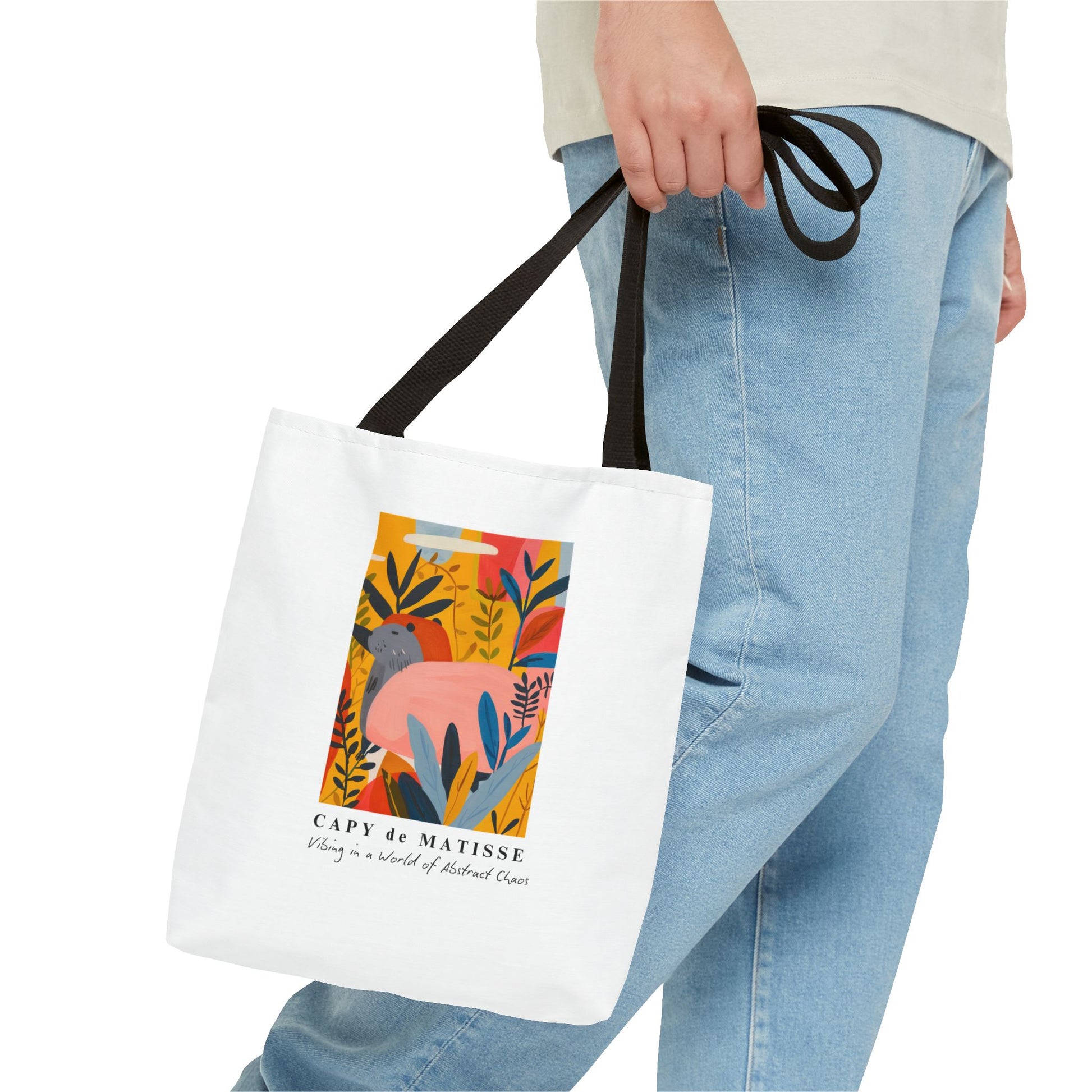 Capybara tote bag featuring a graphic of a painting inspired by artist Henri Matisse. Perfect for art lovers and capybara enthusiasts, this tote bag adds a touch of artistic flair to your everyday errands. Great for carrying books, groceries, or daily essentials. Ideal for art enthusiasts, animal lovers, and those looking to add a pop of creativity to their style. Perfect for gifting on birthdays, holidays, or as a treat for yourself.