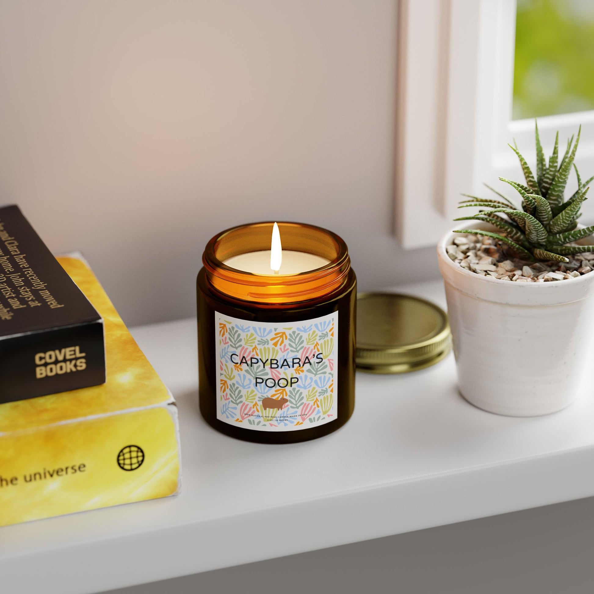 Funny candle gift with CAPYBARAS POOP label in Matisse style. Each candle is scented with Midnight Blackberry, Lavender, Fraser Fir, Cinnamon Chai, Cashmere Musk, Beachwood, Mango Coconut, and Vanilla Bean fragrances, offering up to 20 hours of burn time. Made with natural Coconut Apricot Wax in the USA, eco-friendly and non-toxic.