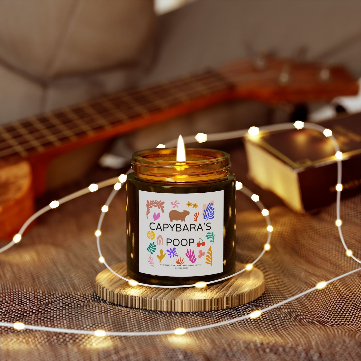 Funny candle gift with CAPYBARAS POOP label in Matisse style. Each candle is scented with Midnight Blackberry, Lavender, Fraser Fir, Cinnamon Chai, Cashmere Musk, Beachwood, Mango Coconut, and Vanilla Bean fragrances, offering up to 20 hours of burn time. Made with natural Coconut Apricot Wax in the USA, eco-friendly and non-toxic.