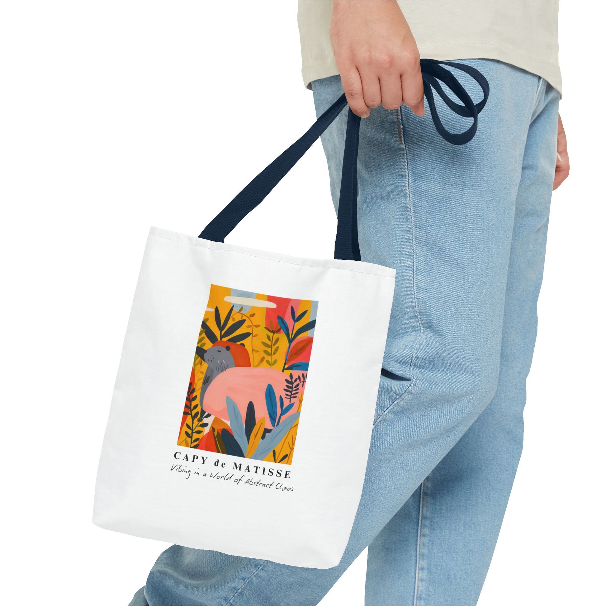 Capybara tote bag featuring a graphic of a painting inspired by artist Henri Matisse. Perfect for art lovers and capybara enthusiasts, this tote bag adds a touch of artistic flair to your everyday errands. Great for carrying books, groceries, or daily essentials. Ideal for art enthusiasts, animal lovers, and those looking to add a pop of creativity to their style. Perfect for gifting on birthdays, holidays, or as a treat for yourself.