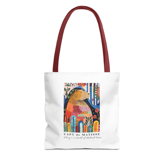 Capybara 13"x13" tote bag featuring a graphic of a painting inspired by artist Henri Matisse, with a hidden capybara. Perfect for art lovers and capybara enthusiasts, this tote bag adds a touch of artistic flair to your everyday errands. Great for carrying books, groceries, or daily essentials. Ideal for art enthusiasts, animal lovers, and those looking to add a pop of creativity to their style. Perfect for gifting on birthdays, holidays, or as a treat for yourself.