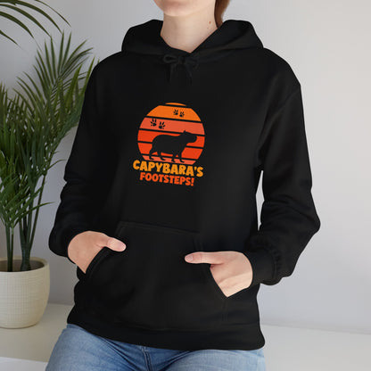 Capybara Footsteps hooded sweatshirt. This hoodies is perfect for those who love for animal lovers and those who appreciate a whimsical touh in their wardrobe.
