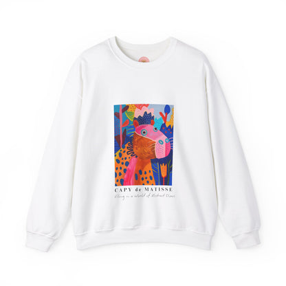 Capybara sweatshirt features a painting inspired by Henri Matisse with a silly capybara embedded inside, perfect for capybara lovers and art enthusiasts. It offers a cozy and comfortable fit, making it ideal for colder months. The medium-heavy fabric blend of cotton and polyester ensures durability and warmth. Great for snuggling up at home or showcasing your unique style.