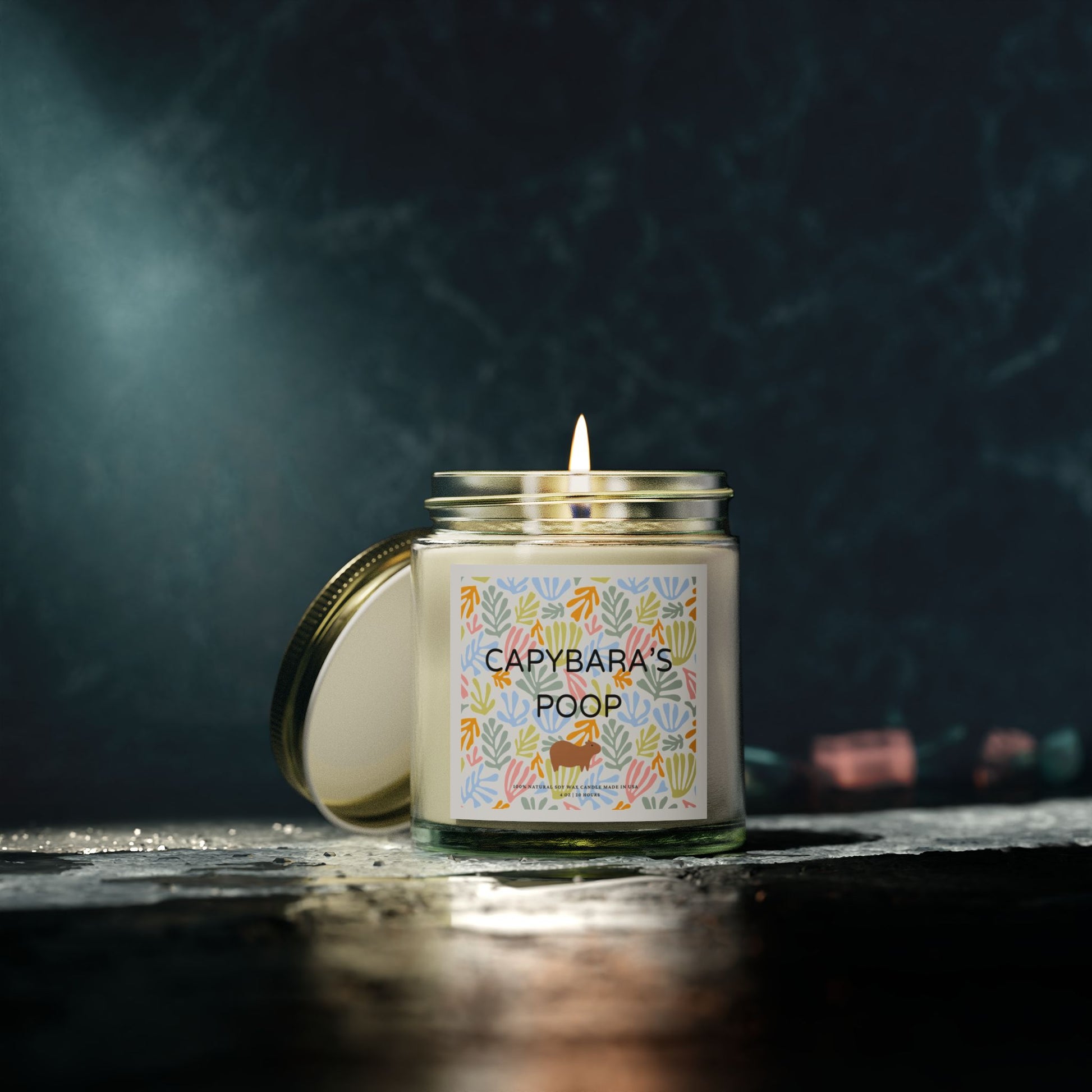 Funny candle gift with CAPYBARAS POOP label in Matisse style. Each candle is scented with Midnight Blackberry, Lavender, Fraser Fir, Cinnamon Chai, Cashmere Musk, Beachwood, Mango Coconut, and Vanilla Bean fragrances, offering up to 20 hours of burn time. Made with natural Coconut Apricot Wax in the USA, eco-friendly and non-toxic.