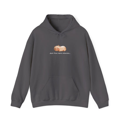 Just Five More Minutes...Capybara Unisex Hooded Sweatshirt is made for the ultimate snoozer! Featuring a relaxed capybara graphic, this cozy hoodie perfectly captures those lazy mornings when you just need a little more time. Soft, warm, and perfect for everyday wear, it’s the ideal companion for staying comfy and showing off your love for capybaras and chill vibes!