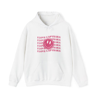 I Love Capybara hooded sweatshirt. This hoodies has a smiley face and is perfect for those who love calm vibes. Soft and comfy, it's an ideal choice for capybara lovers looking for a peaceful, stylish addition to their wardrobe.