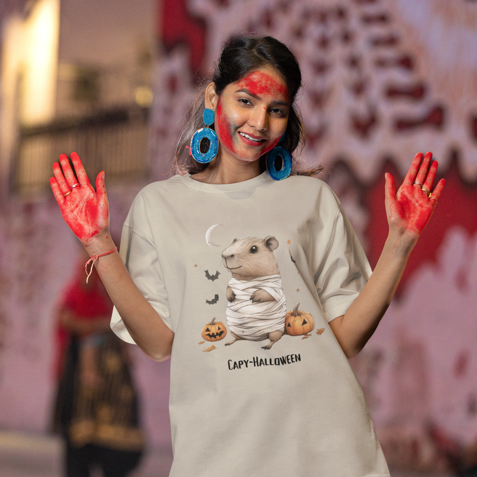 Funny Halloween Capybara T-Shirt, featuring mummy capybara and pumpkin design. For casual wear or costume parties. Available for both adults and kids. Matching outfit for family. Made using 100% US cotton, super comfy, unisex cut design