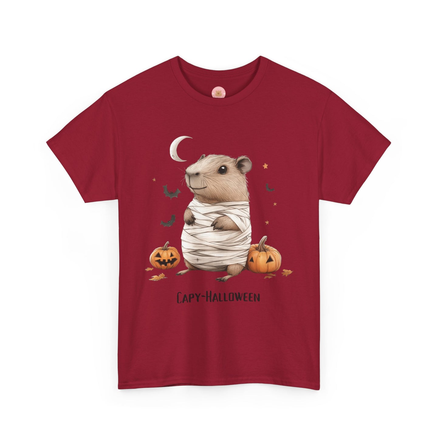 Funny Halloween Capybara T-Shirt, featuring mummy capybara and pumpkin design. For casual wear or costume parties. Available for both adults and kids. Matching outfit for family. Made using 100% US cotton, super comfy, unisex cut design