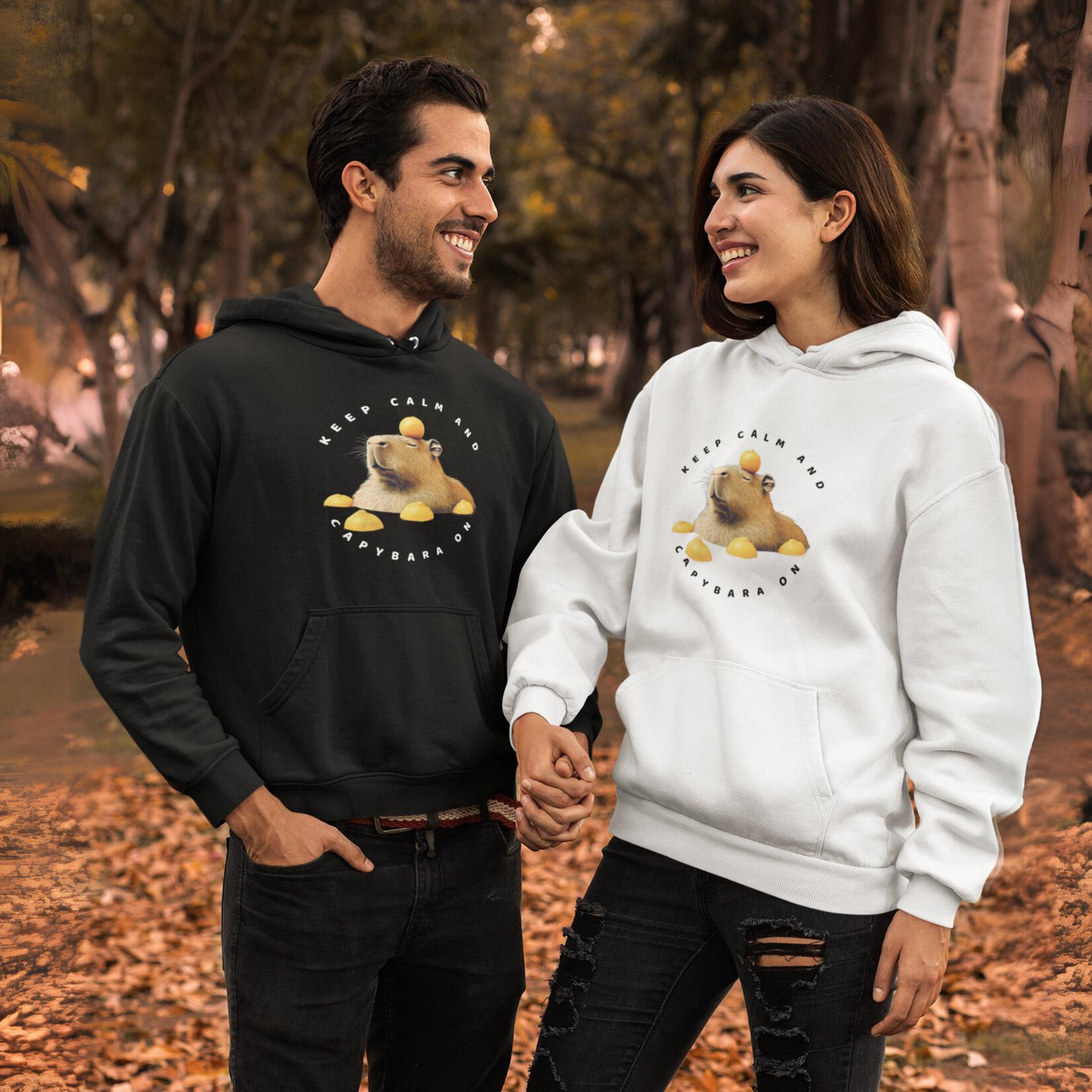Capybara Hoodies- Stay relaxed in style with the Keep Calm and Capybara On hooded sweatshirt. Featuring a relaxing capybara enjoying yuzu bath, this comfy hoodie is perfect for adding a chill vibe to any cold day.&nbsp;This is the PERFECT T-hoodie for those who LOVE Capybara!