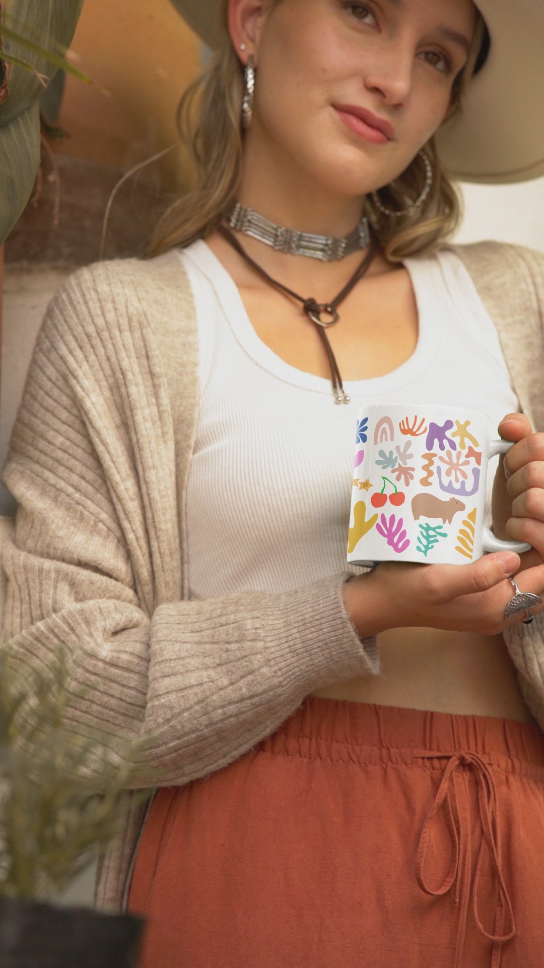 Capybara mug featuring a painting inspired by artist Henri Matisse, with a hidden capybara. Perfect for art lovers and capybara enthusiasts, creating a vibe of abstract chaos. Ideal for cozy mornings or artistic tea breaks. Relevant for art enthusiasts, animal lovers, and those who appreciate unique designs. Perfect for gifting on birthdays, Christmas, or as a thank you present.